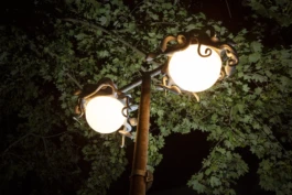 Installation view during nighttime, Alona Rodeh, Nightcaps (Medusas), Brunnenviertel, Berlin 2025 Alona Rodeh, Girl (from the Safe and Sound Poster Series), 2015