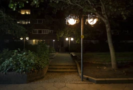 Installation view during nighttime, Alona Rodeh, Nightcaps (Medusas), Brunnenviertel, Berlin 2025 Alona Rodeh, Girl (from the Safe and Sound Poster Series), 2015