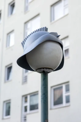 Installation view during nighttime, Alona Rodeh, Nightcaps (Steel Shade), Brunnenviertel, Berlin 2025 Alona Rodeh, Girl (from the Safe and Sound Poster Series), 2015